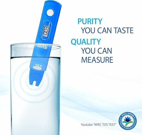 TDS meter testing water purity in glass